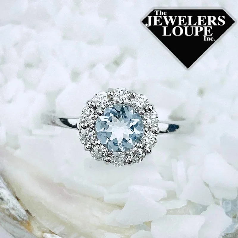 14K White Gold .30ctw Diamond and .55ctw Aquamarine Halo Ring (94166)